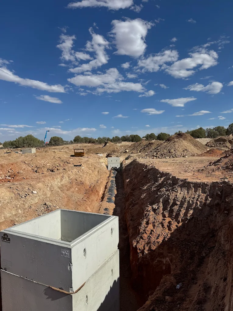 Precast concrete structure and trench
